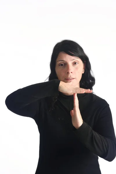 Kadının saat işareti yapması — Stok fotoğraf