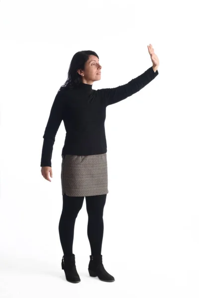 Mujer con el brazo levantado — Foto de Stock