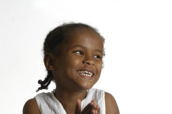 Portrait of a african young girl on white