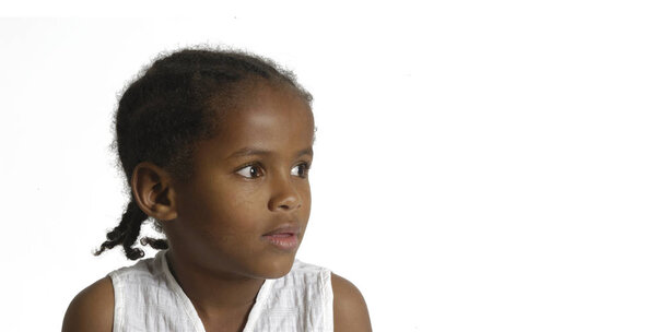 Portrait of a african young girl on white