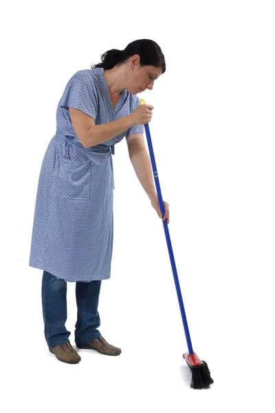 Woman sweeping on white — Stock Photo, Image