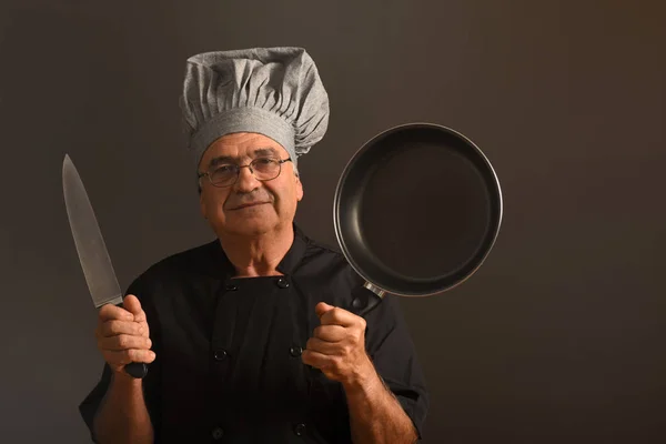 Portret senior szefa kuchni — Zdjęcie stockowe