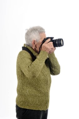 Üst düzey kadın kamera refleks ile çekim