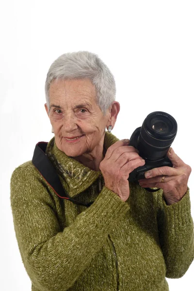 Portret van een senior vrouw met Slr camera — Stockfoto