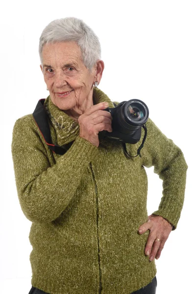 Portret van een senior vrouw met Slr camera — Stockfoto