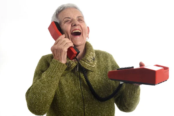Vrouw praten over oude telefoon — Stockfoto