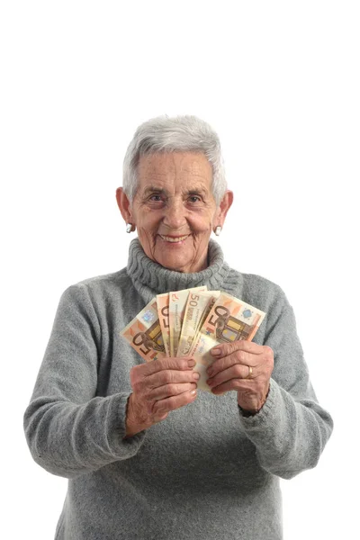 Seniorin mit Geldscheinen — Stockfoto