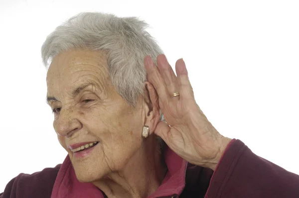 Anciana con dificultad para oír —  Fotos de Stock