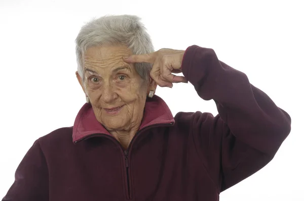 Frau mit Finger auf dem Kopf — Stockfoto