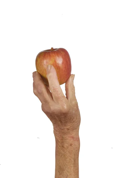 Mão e maçã isoladas em branco — Fotografia de Stock