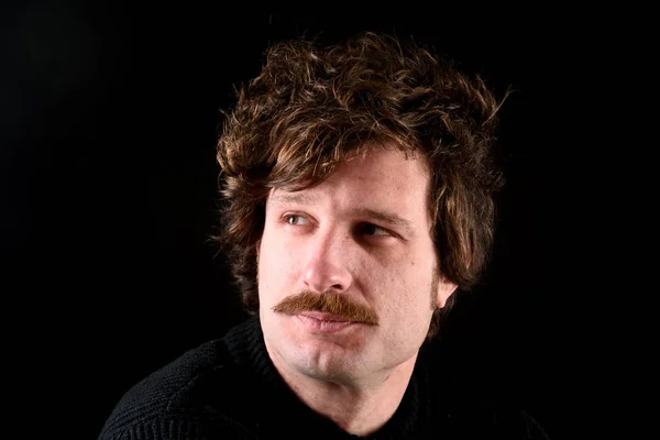 Portrait of a young man on black background — Stock Photo, Image