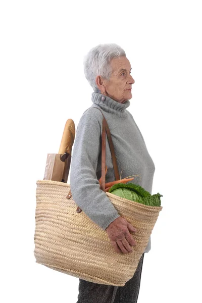 Äldre kvinna går shopping isolerad på vit, — Stockfoto