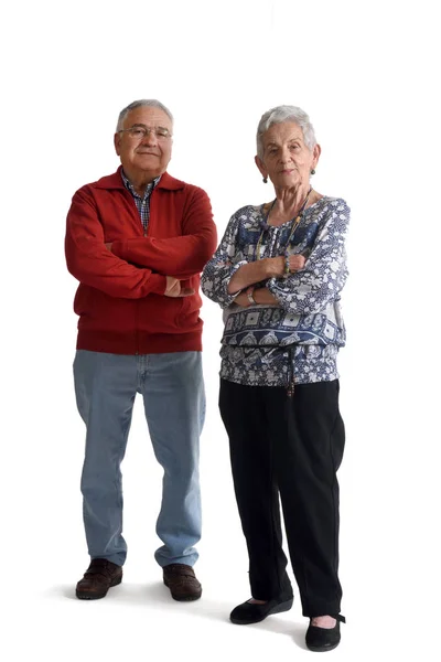 Senior couple with arms crossed on white — Stock Photo, Image