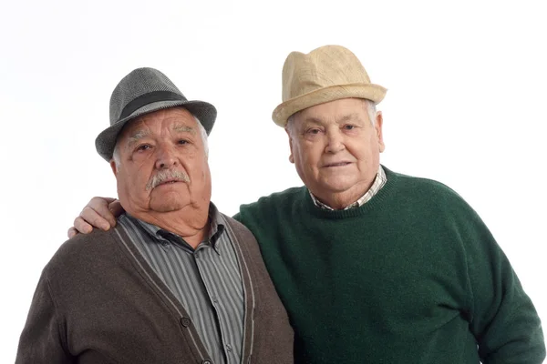 Два старших друга в шляпе — стоковое фото