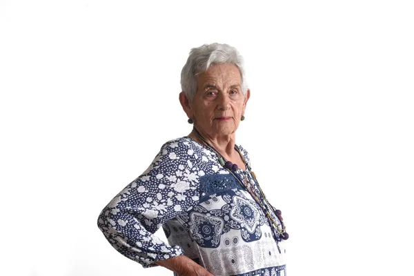 Ritratto di una donna anziana su bianco — Foto Stock