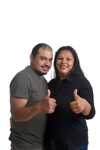 Couple doing the sign thumbs up on white background — Stock Photo, Image