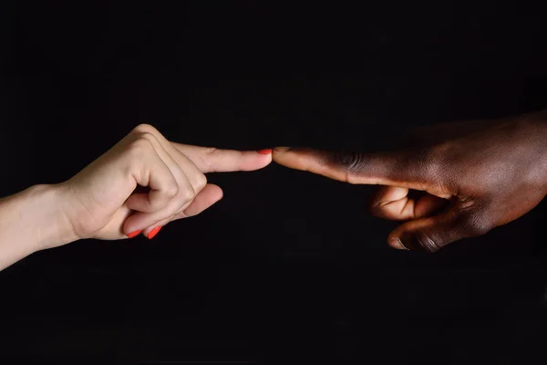 Detail of finger african and caucasian, man and woman — Stock Photo, Image