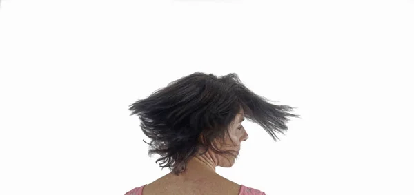 A woman moving her head on white background — Stock Photo, Image