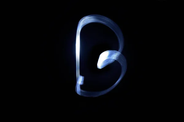 paint with light on black background letter B