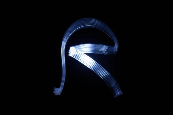 Paint with light on black background letter R — Stock Photo, Image
