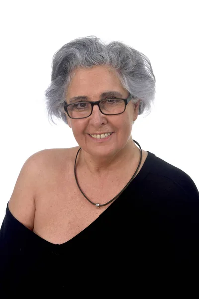 Μια ηλικιωμένη γυναίκα με ένα σέξι ποζάρει στο λευκό φόντο — Φωτογραφία Αρχείου