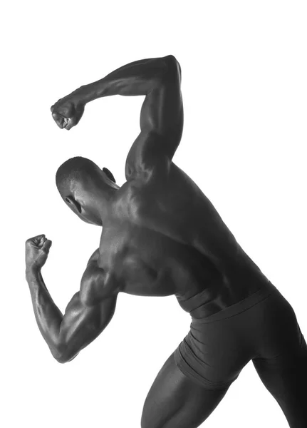 Retrato de um homem atlético preto em suas costas — Fotografia de Stock
