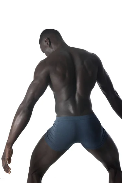 Portrait of a black athletic man on his back — Stock Photo, Image