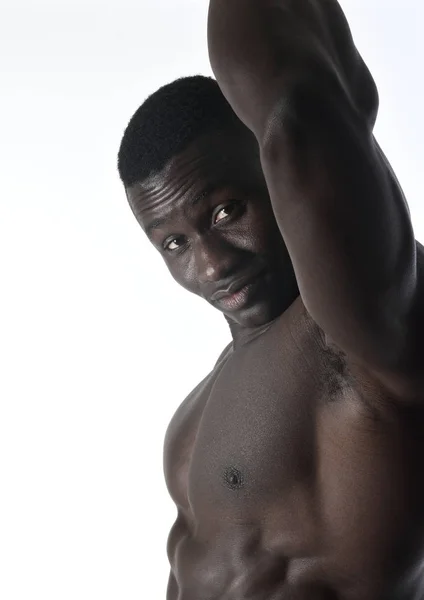 Retrato de un hombre musculoso sobre fondo blanco — Foto de Stock