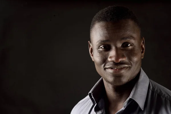 Portrait of a african man on black — Stock Photo, Image