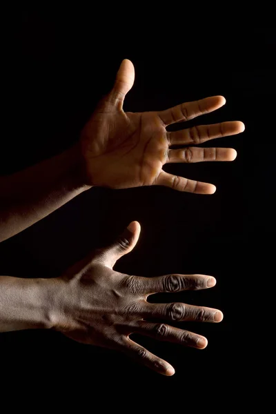 Hands of an african man on white — Stock Photo, Image