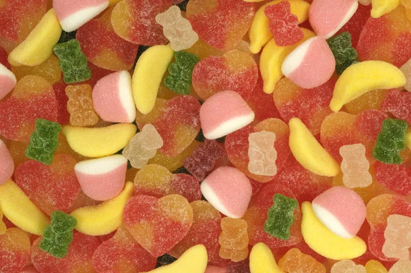 Gemengd van gummy snoepjes van verschillende kleuren en vormen — Stockfoto