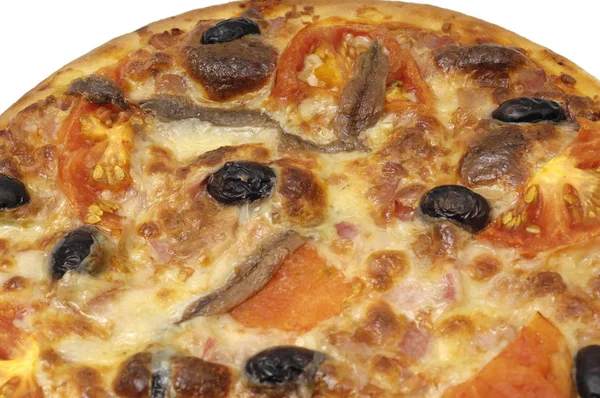 Подробности пиццы с анчоусами томатных оливок — стоковое фото