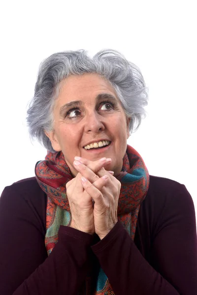 Porträt einer Seniorin auf weißem Hintergrund — Stockfoto