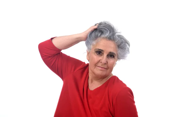 Porträtt av en äldre kvinna händerna på huvudet, — Stockfoto