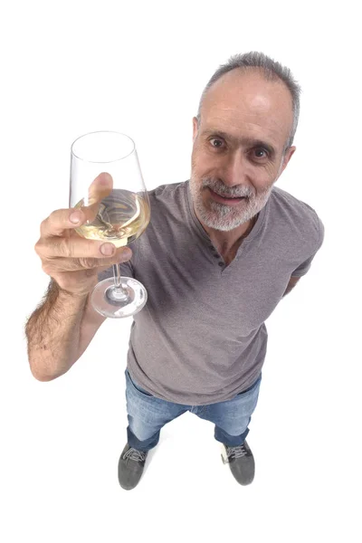 Homem com um golpe de vinho branco no fundo branco — Fotografia de Stock