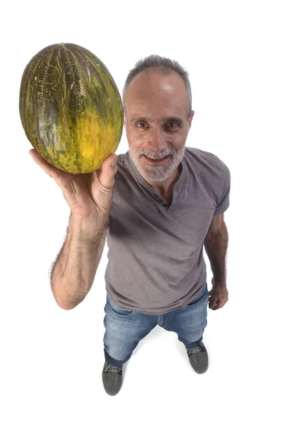 Hombre con melón sobre fondo blanco — Foto de Stock