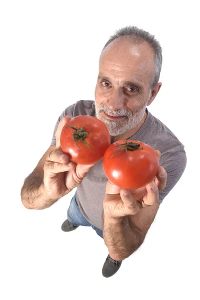 Retrato de un hombre con tomate sobre fondo blanco —  Fotos de Stock