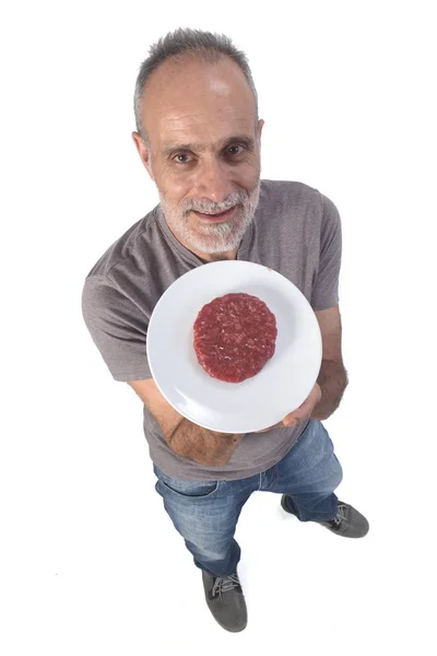 흰 바탕에 햄버거를 먹은 남자 — 스톡 사진