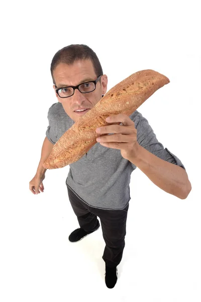 Homem com pão sobre fundo branco — Fotografia de Stock
