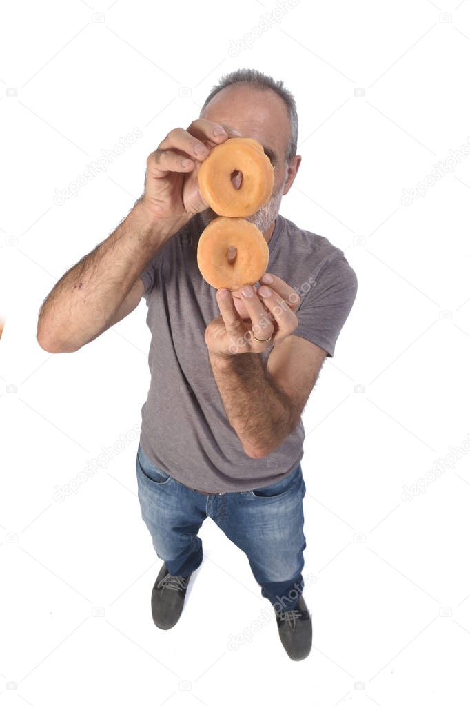 man with donut on white background