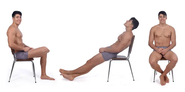 Um homem nu sentado de várias maneiras em uma cadeira — Fotografia de Stock