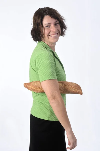 白を基調としたパンを持つ女性 — ストック写真
