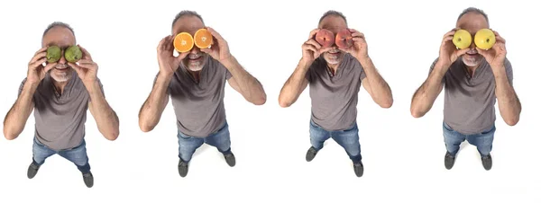 Top view of a man with fruits in his eyes — Stock Photo, Image