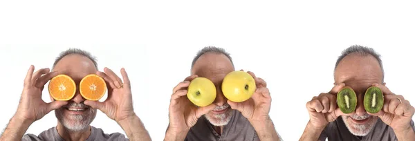 Mann mit Früchten in den Augen — Stockfoto