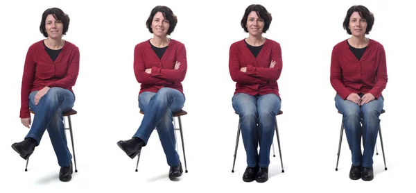 Kvinna sitter på en stol med olika poser på vit — Stockfoto