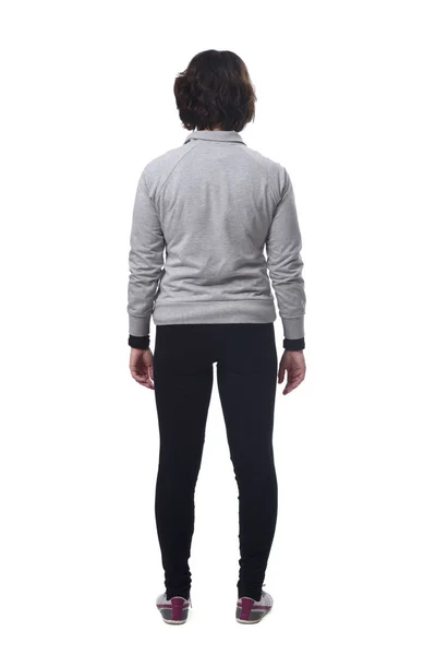 Rear view of a woman with sportswear on white background — Stock Photo, Image