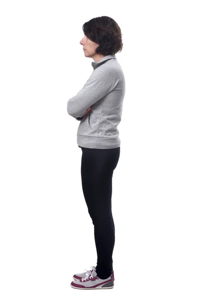 Seitenansicht einer Frau mit weißem Hintergrund, die Arme verschränkt — Stockfoto