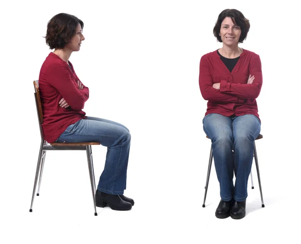 Woman sitting on a chair back and front on white background,arms — Stockfoto