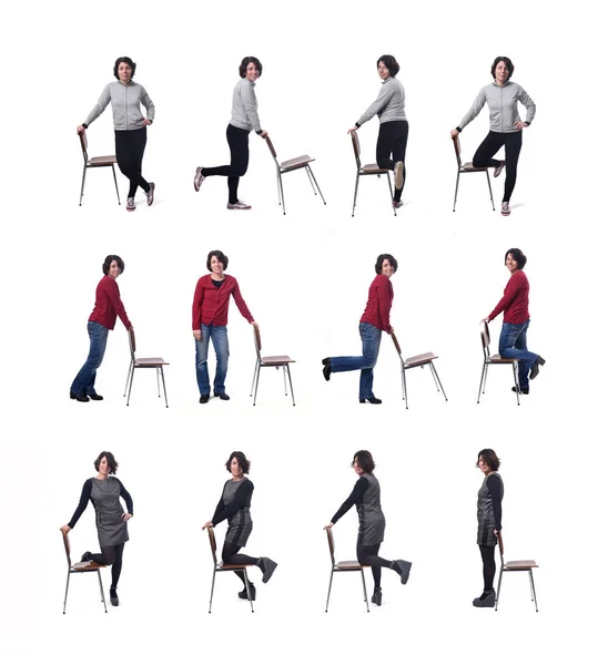 Velká Skupina Žen Hrát Židlí Bílém Pozadí — Stock fotografie