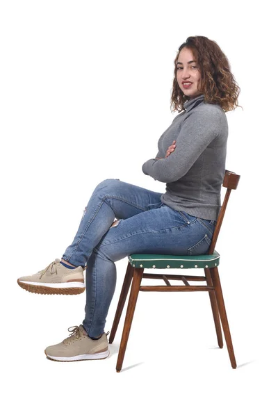 Portrait Woman Sitting Chair White Background Looking Camera Legs Arms — Stock Photo, Image